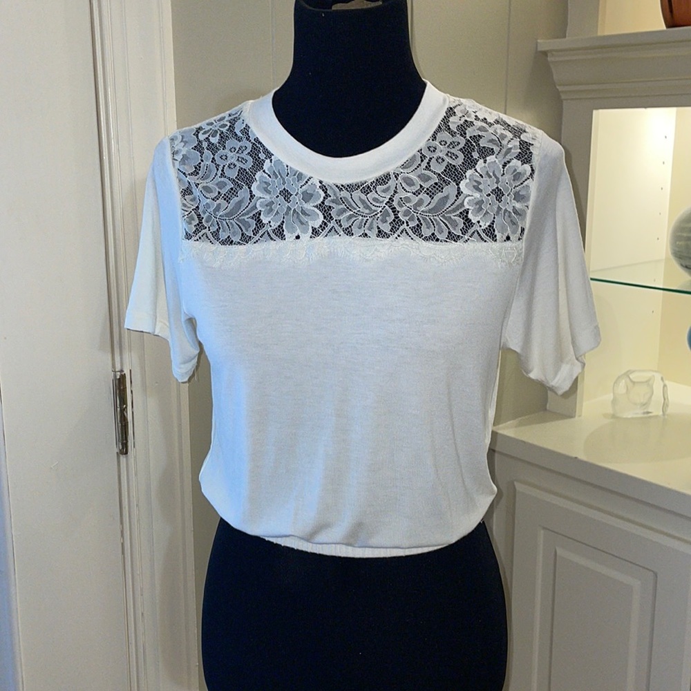 POOF New York cropped top with lace upper part and elastic waist. Size small.